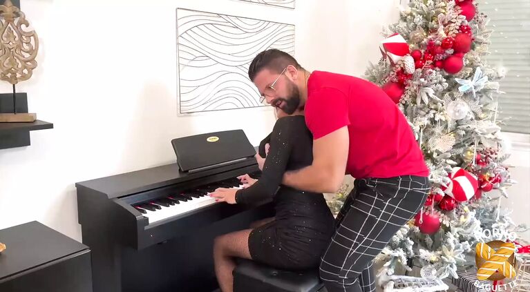 Alice Wild studies her piano teacher's fingering!