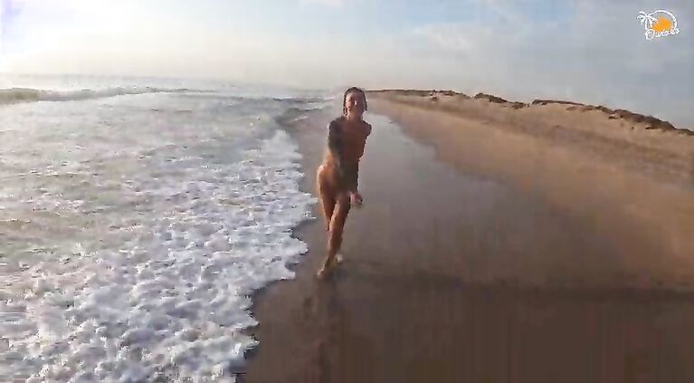Real couple having fun on a nudist beach. Sexy wet blowjob