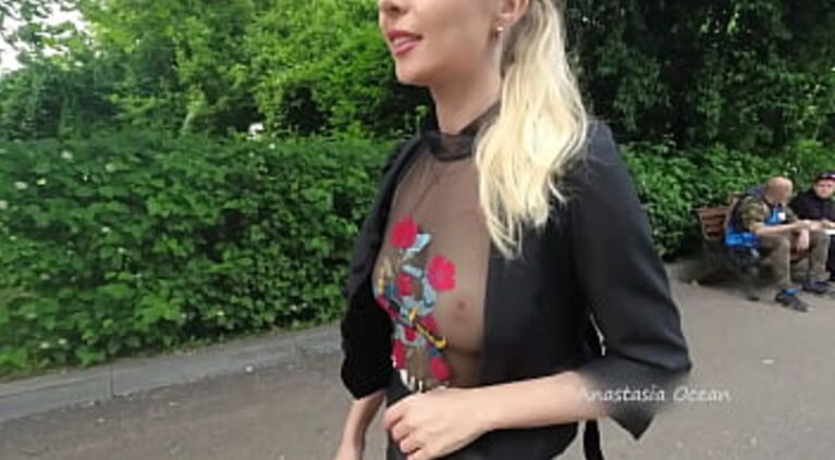 Public walk in transparent t-shirt in peak hour